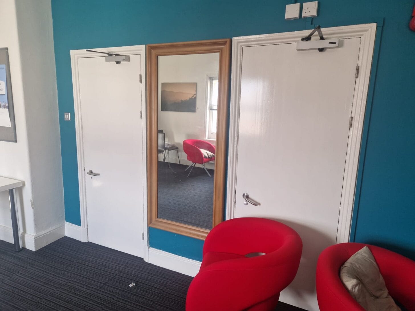 Teal feature wall in a commercial office
