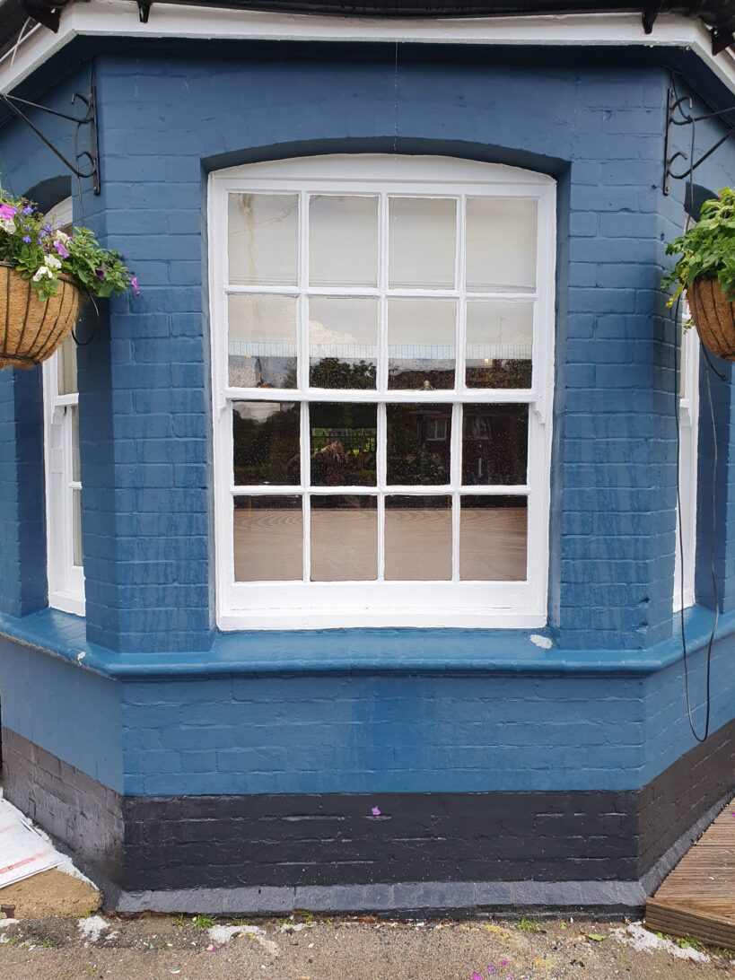Pub exterior repaint, bay window