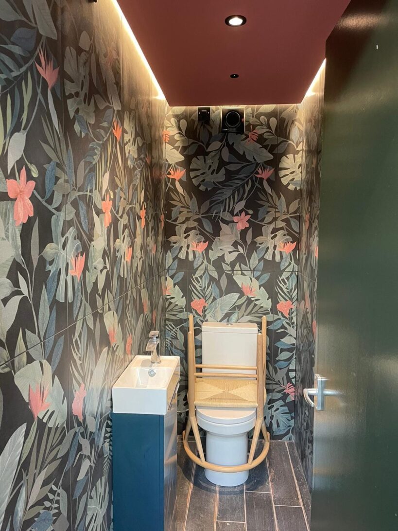 Pub toilets decorated with feature wallpaper