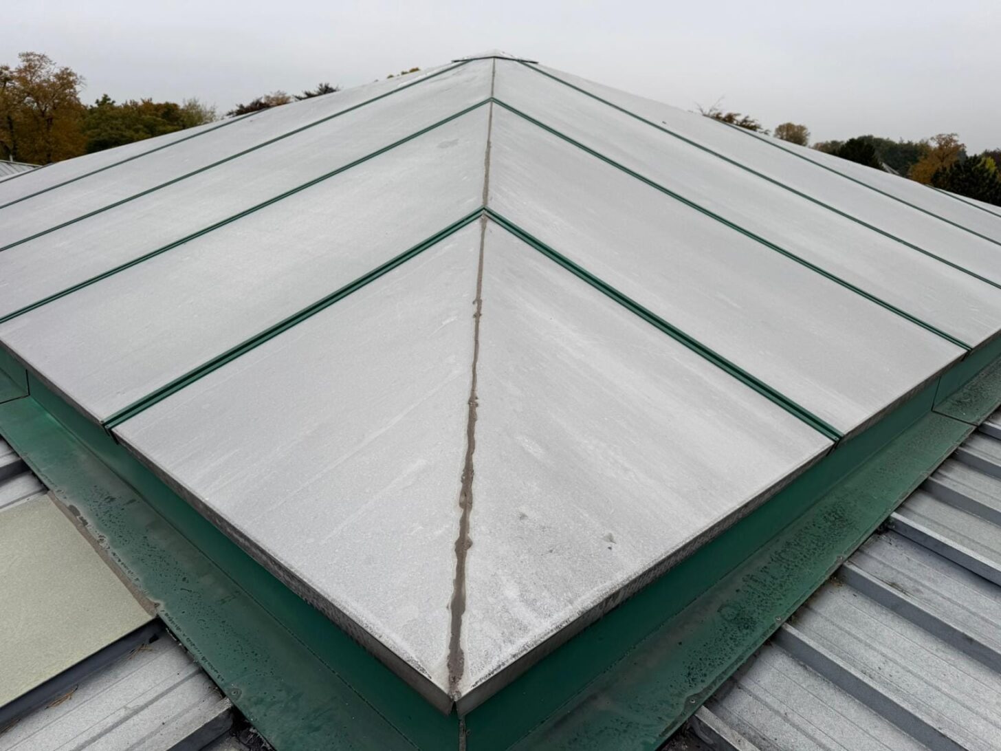 Commercial roof coating, ridge detail