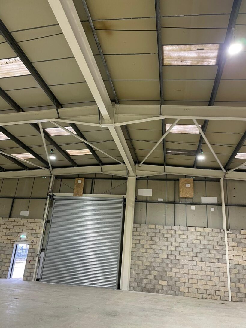 Large warehouse interior with roller shutter